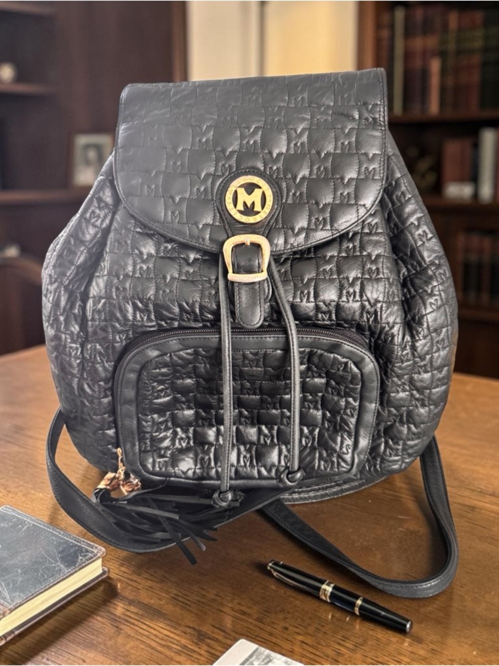 Black Quilted Metrocity Backpack with Gold Logo Hardware